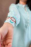Sky blue top hand work
