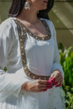 White suit hand work